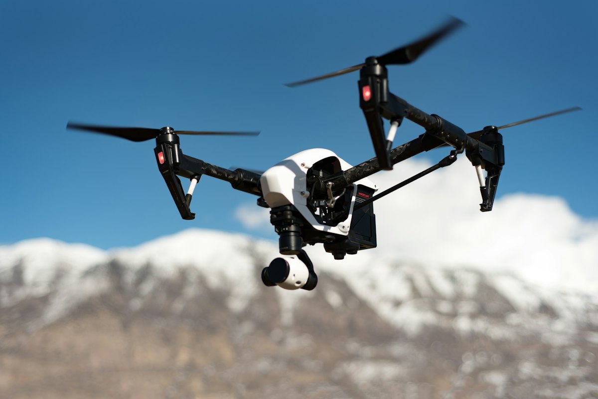 Quadcopter drone with camera hovering